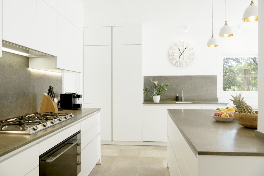 The bespoke kitchen with fitted appliances and gas hob
